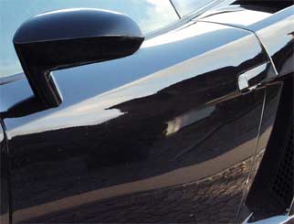 Der Lackdoktor bzw. Beulendoktor verwendet moderne Technik uns Spezialwerkzeuge zur Beseitigung kleiner Lackschäden und Beulen 